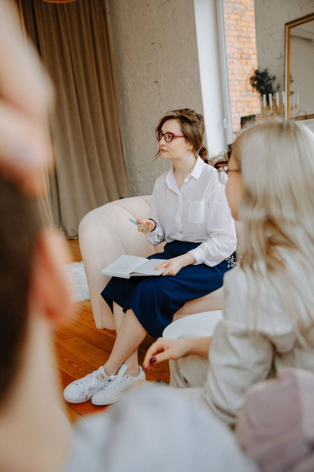 A counselor listening during a session